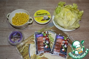 Закуска из крабовых палочек и кальмаров в тортилье